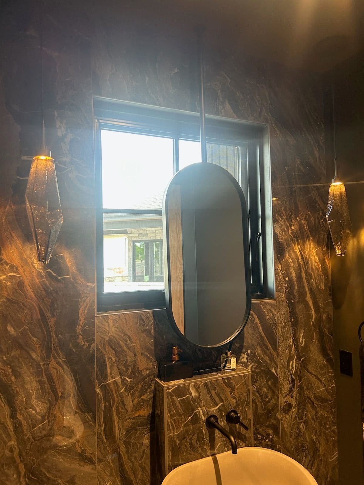 Luxurious Bathroom Remodel with Accent Pendant Lighting image